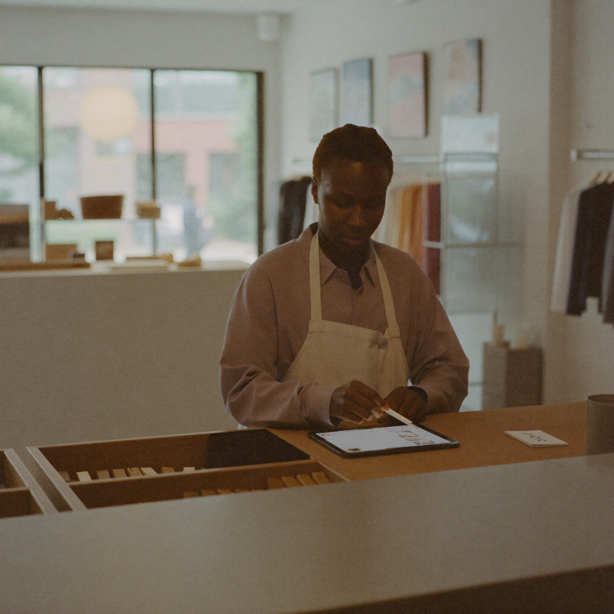 SME retail store owner checking stock levels